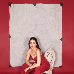 Actress Sara Ali Khan Exudes Elegance in Red Pinstripe Jumpsuit