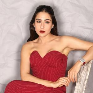 Actress Sara Ali Khan Exudes Elegance in Red Pinstripe Jumpsuit