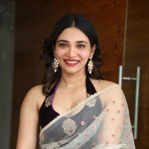 Actress Jennifer in Elegant Traditional Saree - Stunning Look with Floral Embroidery