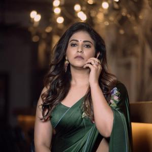 Anjali in Elegant Green Satin Saree with Floral Embroidery | Stunning Actress Look