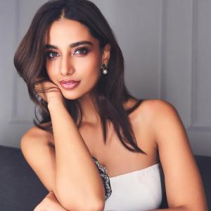 Meenakshi Chaudhary Elegant White Dress Photo - Actress Fashion Style