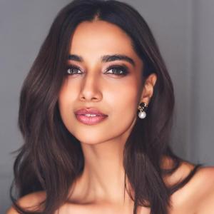 Meenakshi Chaudhary Elegant White Dress Photo - Actress Fashion Style