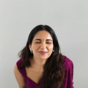 Ruhani Sharma Looks Graceful in Wine-Colored Saree with Floral Charm