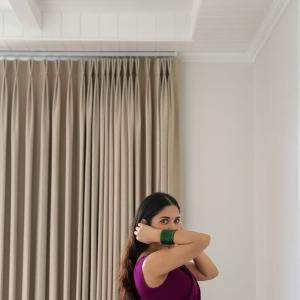 Ruhani Sharma Looks Graceful in Wine-Colored Saree with Floral Charm