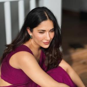 Ruhani Sharma Looks Graceful in Wine-Colored Saree with Floral Charm