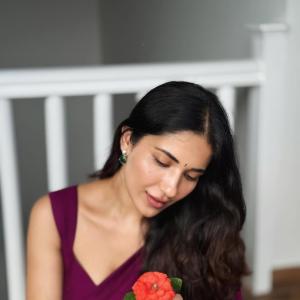 Ruhani Sharma Looks Graceful in Wine-Colored Saree with Floral Charm