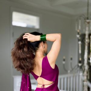 Ruhani Sharma Looks Graceful in Wine-Colored Saree with Floral Charm