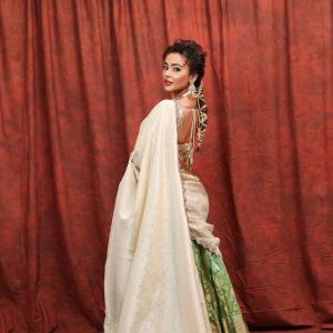 Seerat Kapoor Dazzles in Ivory and Green Banarasi Lehenga Look