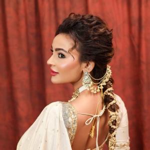 Seerat Kapoor Dazzles in Ivory and Green Banarasi Lehenga Look
