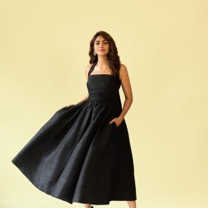 Mrunal Thakur Looks Effortlessly Elegant in a Halter Neck Black Gown