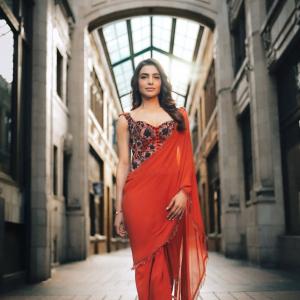 Actress Samantha Shines in an Elegant Orange Saree with Embroidered Blouse