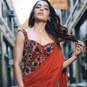 Actress Samantha Shines in an Elegant Orange Saree with Embroidered Blouse