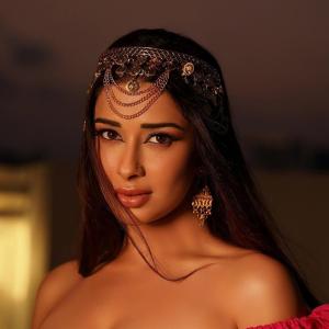 Nyraa Banerjee Radiates Royal Glamour in Bold Pink Outfit and Traditional Jewelry