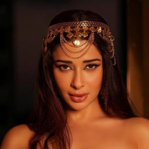 Nyraa Banerjee Radiates Royal Glamour in Bold Pink Outfit and Traditional Jewelry