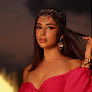 Nyraa Banerjee Radiates Royal Glamour in Bold Pink Outfit and Traditional Jewelry