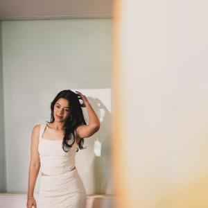 Mirnalini Ravi Exudes Elegance in Stunning White Lace Outfit