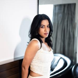 Mirnalini Ravi Exudes Elegance in Stunning White Lace Outfit