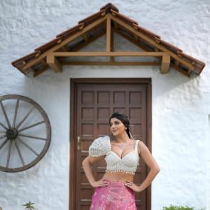 Yashika Anand Turns Heads in Pearl Blouse and Pink Lehenga Look