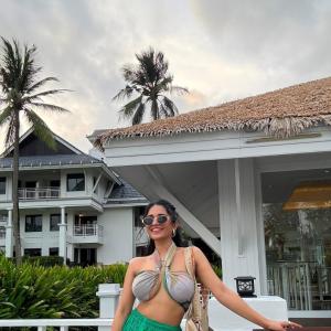 Ruhani Sharma Embraces Tropical Vibes in Halter Top and Green Skirt