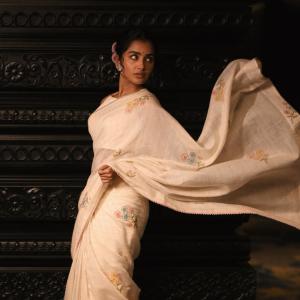 Anupama Parameswaran Exudes Elegance in Cream Saree with Floral Embroidery