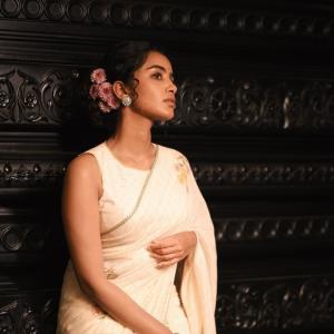 Anupama Parameswaran Exudes Elegance in Cream Saree with Floral Embroidery