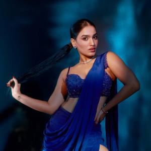 Actress Saniya Iyyappan in Elegant Blue Saree and Trendy Golden Outfit | Stylish Looks