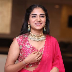 Malavika Manoj in Traditional Pink Outfit – Elegant Jewelry & Graceful Style