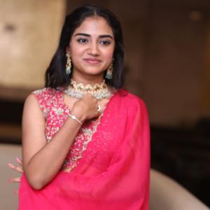 Malavika Manoj in Traditional Pink Outfit – Elegant Jewelry & Graceful Style