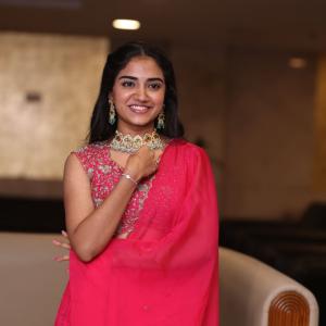 Malavika Manoj in Traditional Pink Outfit – Elegant Jewelry & Graceful Style