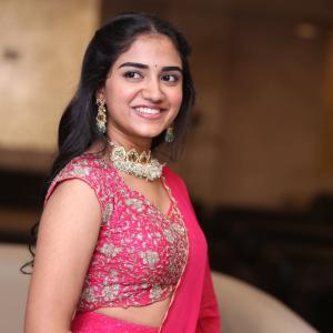 Malavika Manoj in Traditional Pink Outfit – Elegant Jewelry & Graceful Style