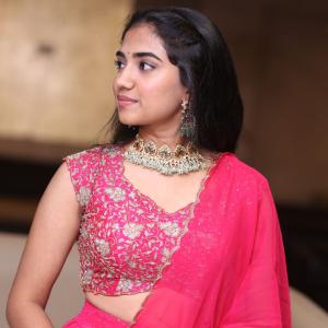 Malavika Manoj in Traditional Pink Outfit – Elegant Jewelry & Graceful Style