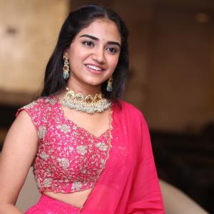 Malavika Manoj in Traditional Pink Outfit – Elegant Jewelry & Graceful Style