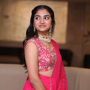 Malavika Manoj in Traditional Pink Outfit – Elegant Jewelry & Graceful Style