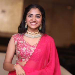 Malavika Manoj in Traditional Pink Outfit – Elegant Jewelry & Graceful Style