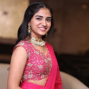 Malavika Manoj in Traditional Pink Outfit – Elegant Jewelry & Graceful Style