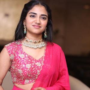 Malavika Manoj in Traditional Pink Outfit – Elegant Jewelry & Graceful Style