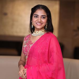 Malavika Manoj in Traditional Pink Outfit – Elegant Jewelry & Graceful Style