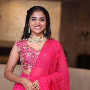 Malavika Manoj in Traditional Pink Outfit – Elegant Jewelry & Graceful Style