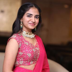 Malavika Manoj in Traditional Pink Outfit – Elegant Jewelry & Graceful Style