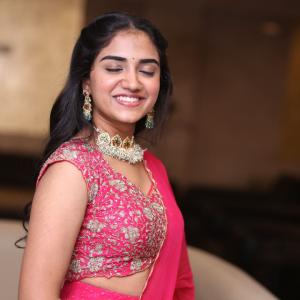 Malavika Manoj in Traditional Pink Outfit – Elegant Jewelry & Graceful Style