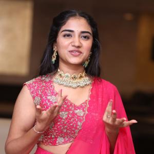 Malavika Manoj in Traditional Pink Outfit – Elegant Jewelry & Graceful Style