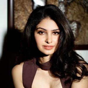 Manasa Varanasi Elegant Photo Shoot with Artistic Metal Artwork