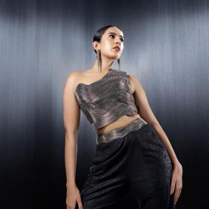 Niharika Konidela Stunning Metallic Fashion Look in One-Shoulder Top and Flared Pants