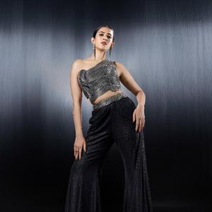 Niharika Konidela Stunning Metallic Fashion Look in One-Shoulder Top and Flared Pants