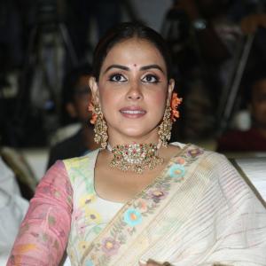 Elegant Genelia D'Souza in Traditional Floral Saree with Statement Jewelry