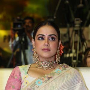 Elegant Genelia D'Souza in Traditional Floral Saree with Statement Jewelry