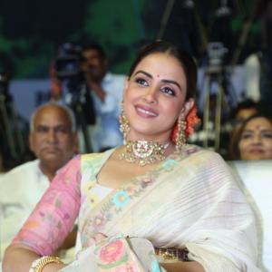 Elegant Genelia D'Souza in Traditional Floral Saree with Statement Jewelry