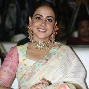 Elegant Genelia D'Souza in Traditional Floral Saree with Statement Jewelry