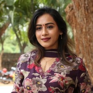 Preeti Sunder Elegant Floral Purple Outfit with Traditional Jewelry