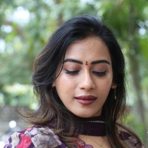 Preeti Sunder Elegant Floral Purple Outfit with Traditional Jewelry